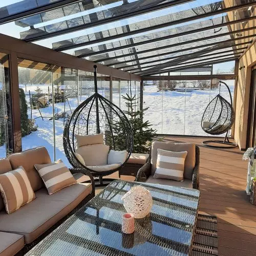 Leisure on the terrace all year round. Pergolas, awnings, glass roofs and facade blinds from SUNŻAL