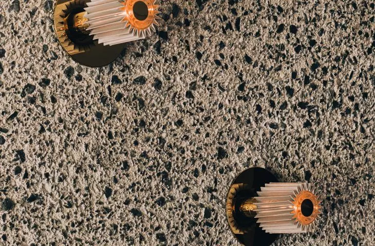 Textured architectural concrete walls with exposed aggregate were one of the biggest challenges for designers