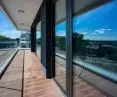 Decalu 88 system has been stylistically complemented with Twinson composite decking boards