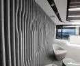 Acoustic wall of felt fins with embossed logo