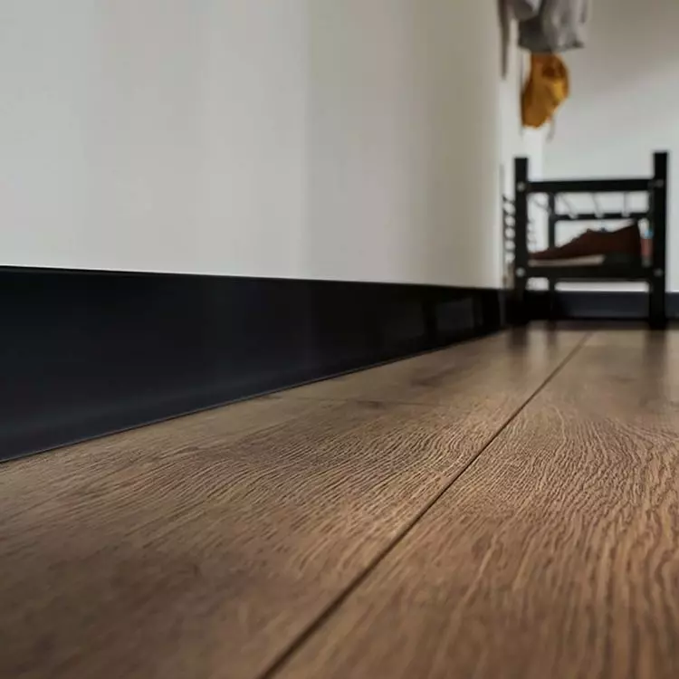 The strip protects the wall from impacts and moisture