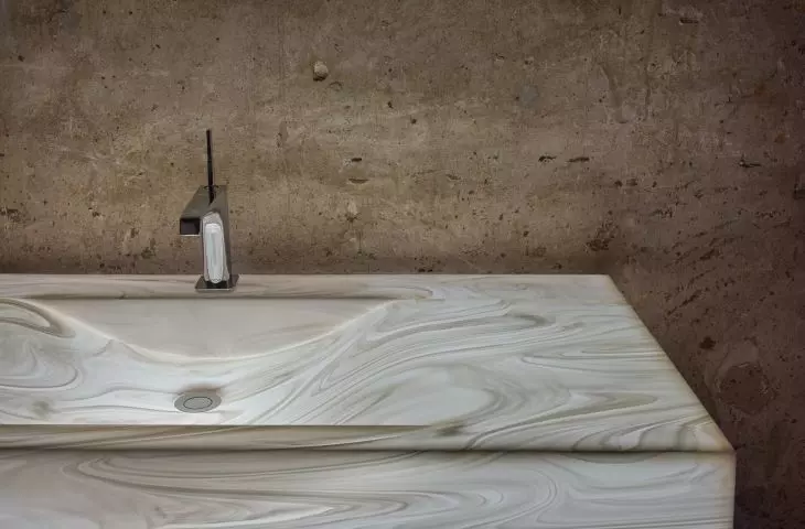 AWAN - Oneiric Mist | Corian® White Onyx Washbasin in a version illuminated by LED panels
