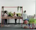From left: Mobile acoustic wall, Variant meeting space, Variant compact desk with folding top, writing board and electric height adjustment.