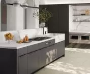 Kitchen with integrated sink finished with Laminam quartz sintering from I-NATURALI Calacatta Michelangelo collection