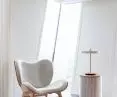 A Conversation Piece armchair, Audacious upholstered table, Umage