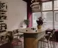 In the center of the premises stands a large table covered with mosaics