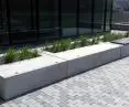 Prefabricated architectural concrete flower pots and benches