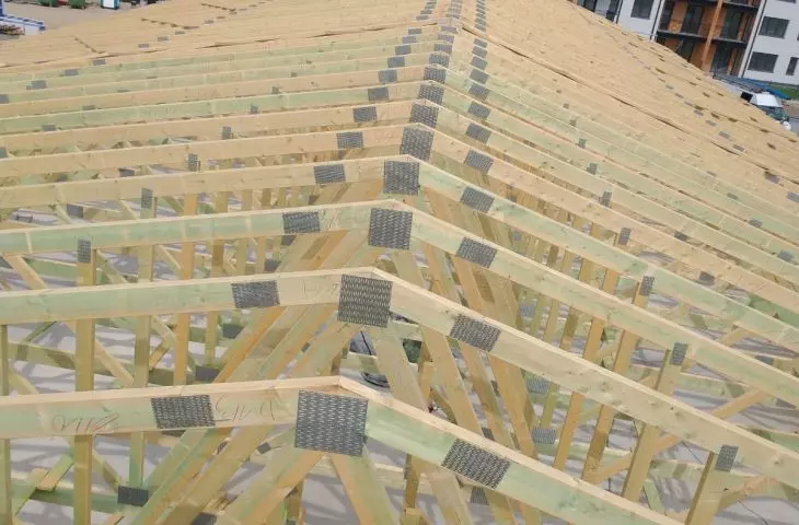 Prefabricated trusses installed on a multi-family building