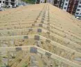 Prefabricated trusses installed on a multi-family building