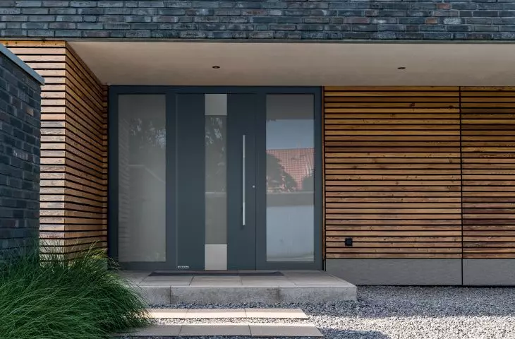 ThermoCarbon aluminum door, pattern 680 in RAL 7015 with side elements
