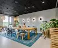 The office is divided into spaces for solitary as well as group work