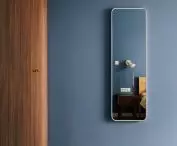 Geometryczne lustro w sypialni