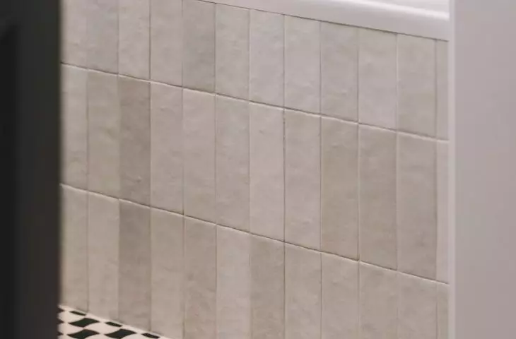 The floor of one of the bathrooms is decorated with corsages