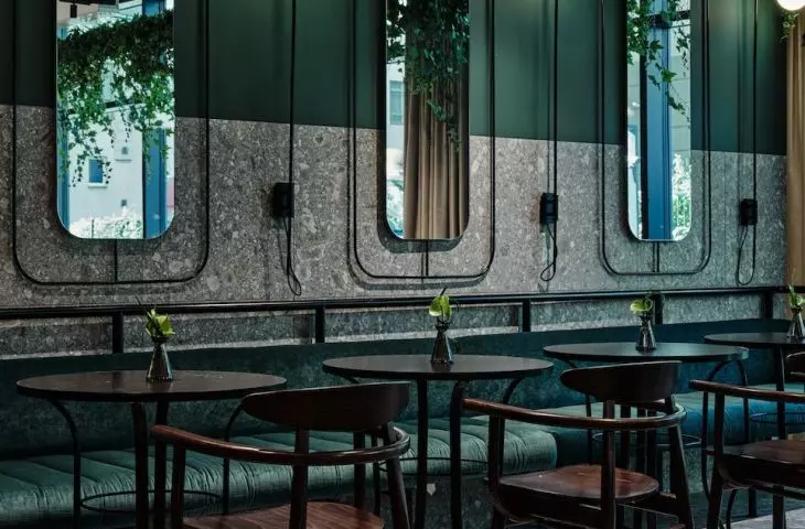 The restaurant space is kept in green colors