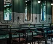 The restaurant space is kept in green colors