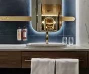 All bathrooms are characterized by gold accessories