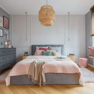 Bedroom maintained in shades of gray  