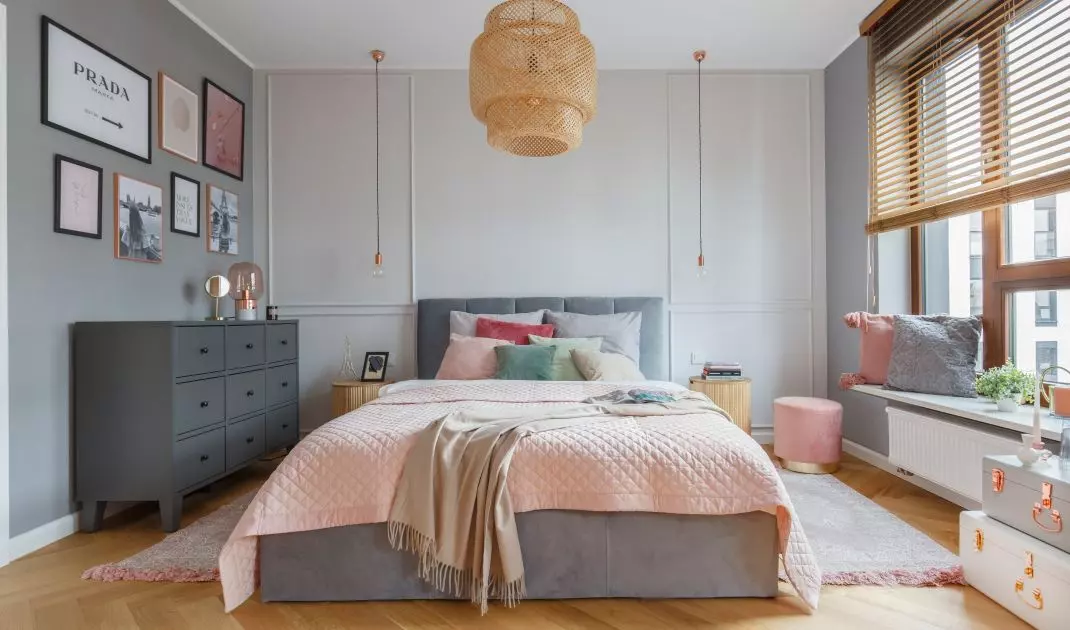 Bedroom maintained in shades of gray  