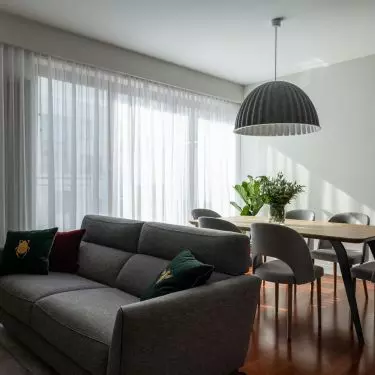 The living room has been divided into zones