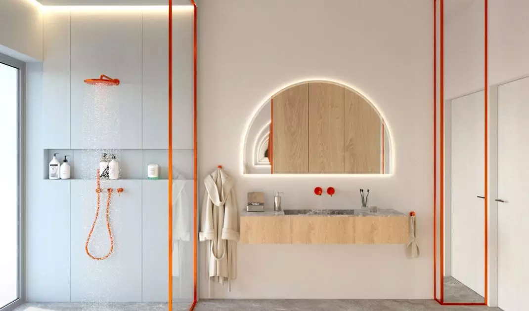 Subdued tones of the bathroom were broken with orange elements