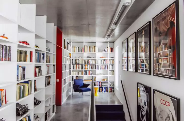 A full wall bookcase will work perfectly in this style interior
