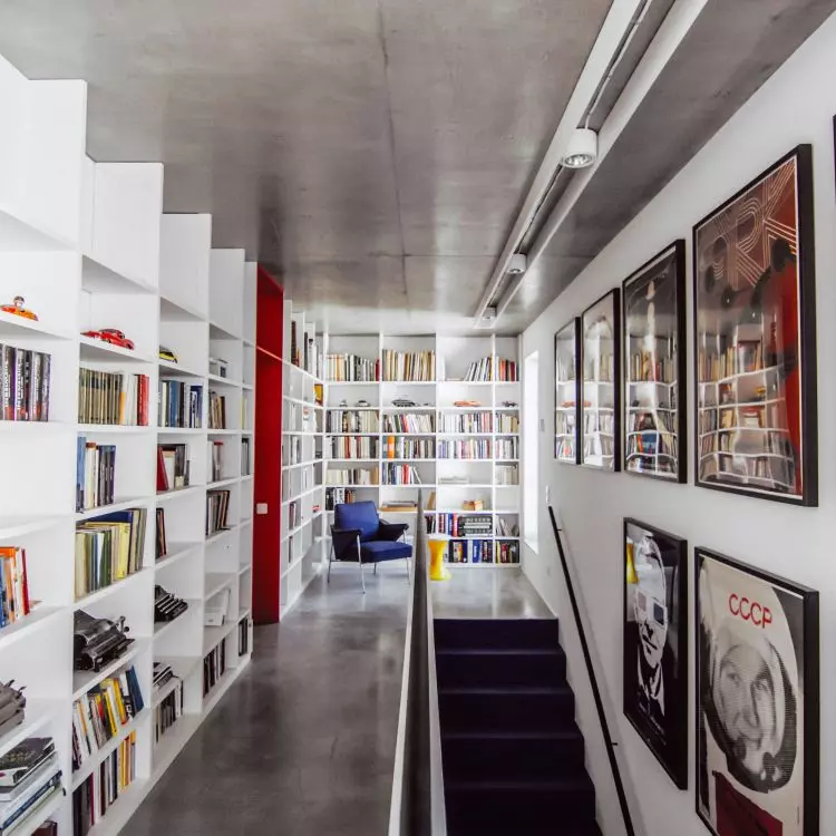 A full wall bookcase will work perfectly in this style interior