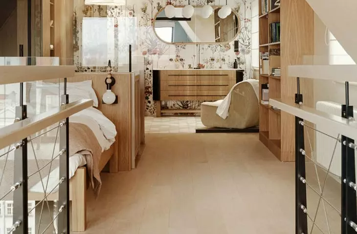 large bathroom is separated only by a glass wall