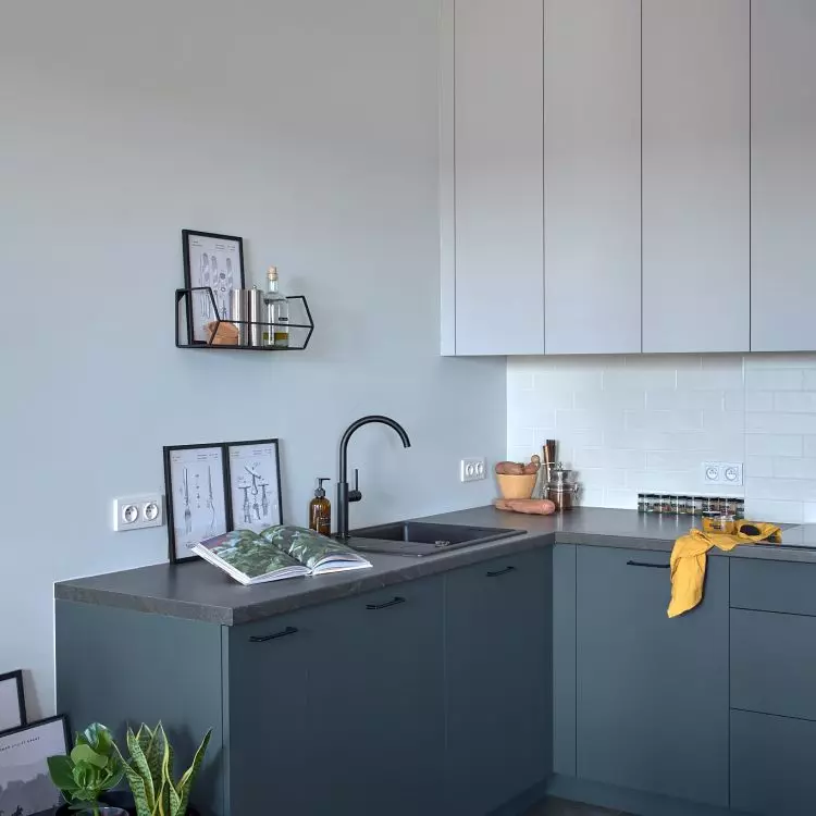 The kitchen matches the rest of the apartment in color