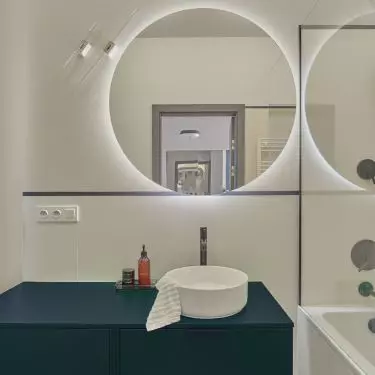 The bathroom is maintained in a minimalist style