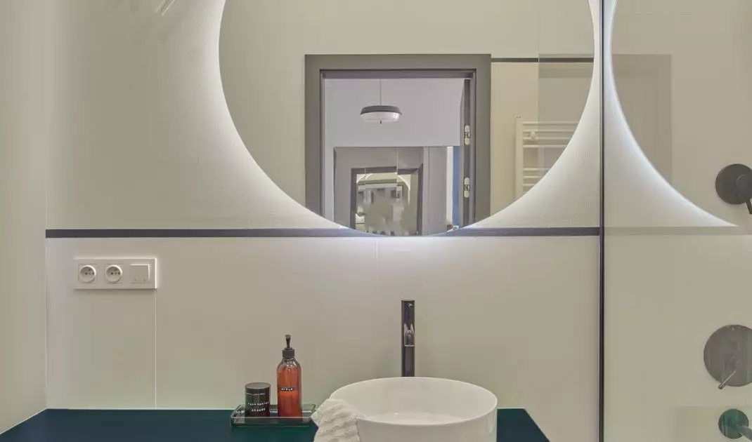 The bathroom is maintained in a minimalist style