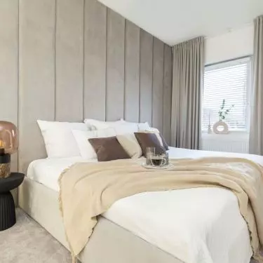 The apartment is maintained in natural colors