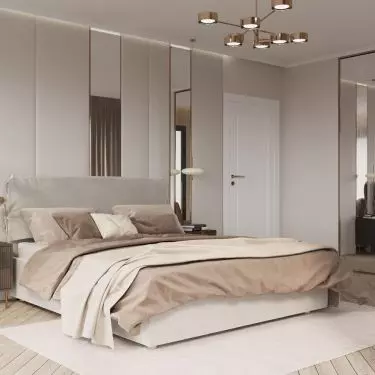 The bedroom has mirrors on two walls