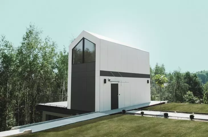  Phoenix two-storey house erected on prepared garage with floor slab