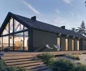 A modern barn-type house built using precast concrete technology; the choice of technology does not limit what material will be on the facade