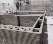 trials and experiments on printing buildings from concrete on a 3D printer are being undertaken by REbuild; the technology is still being improved, including process automation, refinement of the concrete mix, and wall texture effects