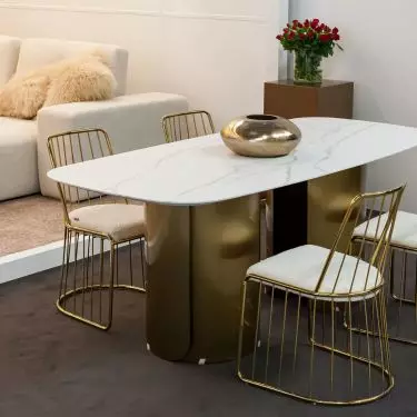Another suggestion for the dining room is the Mulah sintered table and Fiji chairs in Boucle fabric