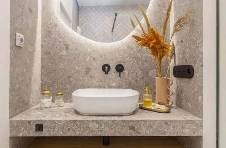 In the bathroom you will find light wood