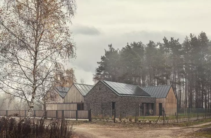 The house was built on a plot of land under the forest