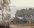 The house was built on a plot of land under the forest
