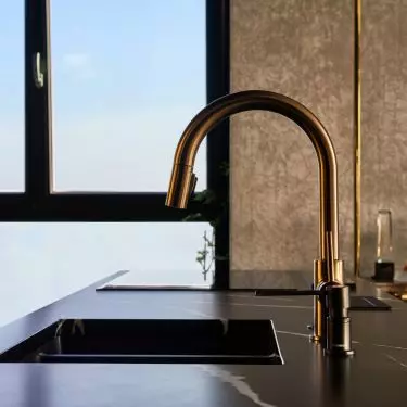 Gold kitchen faucets are an interior decoration
