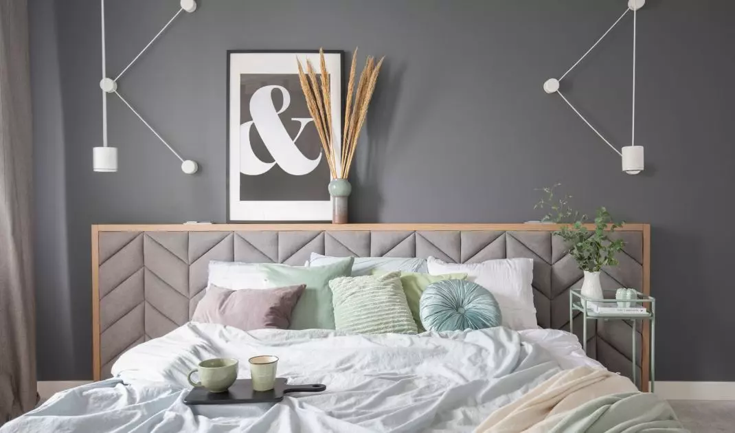 Bed with upholstered headrest 