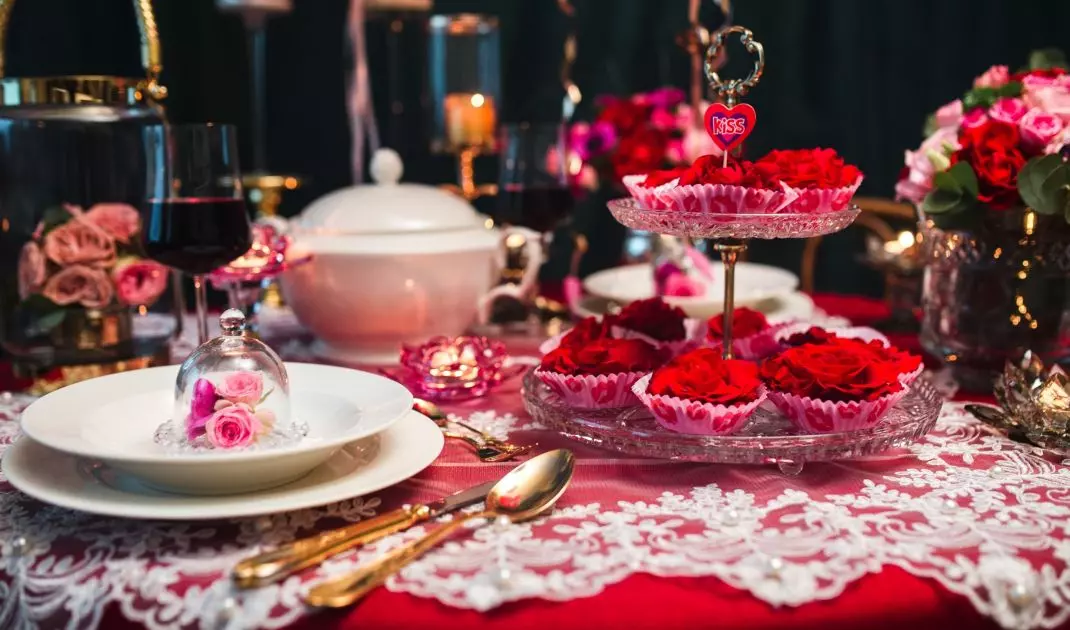 Put a bunch of roses in a decorative dome