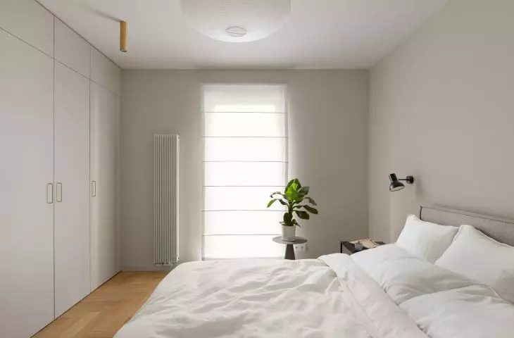 The bedroom was decorated in neutral colors