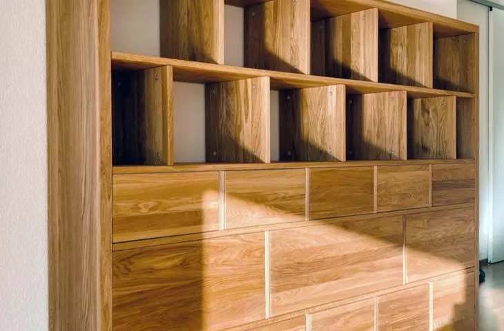 Bookcase without pedestal with frame in thickness of 4 cm, other elements 2 cm. Solid oak clear oil wax