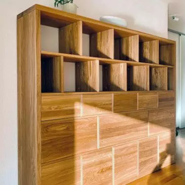 Bookcase without pedestal with frame in thickness of 4 cm, other elements 2 cm. Solid oak clear oil wax