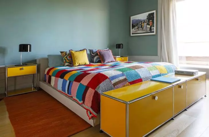 Bedroom with yellow cabinets 