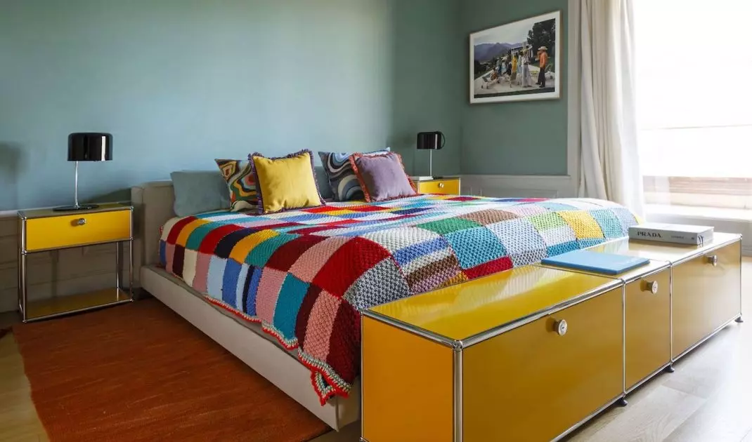 Bedroom with yellow cabinets 