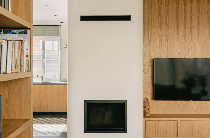 the interior is dominated by white, black and wood