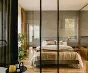 glass wall between bedroom and bathroom