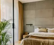 raw concrete wall in the bedroom